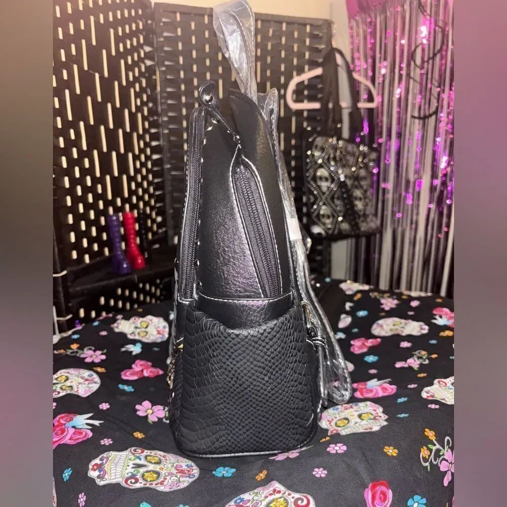 Edgy Backpack with Studded Skull Design - Picture 4 of 6